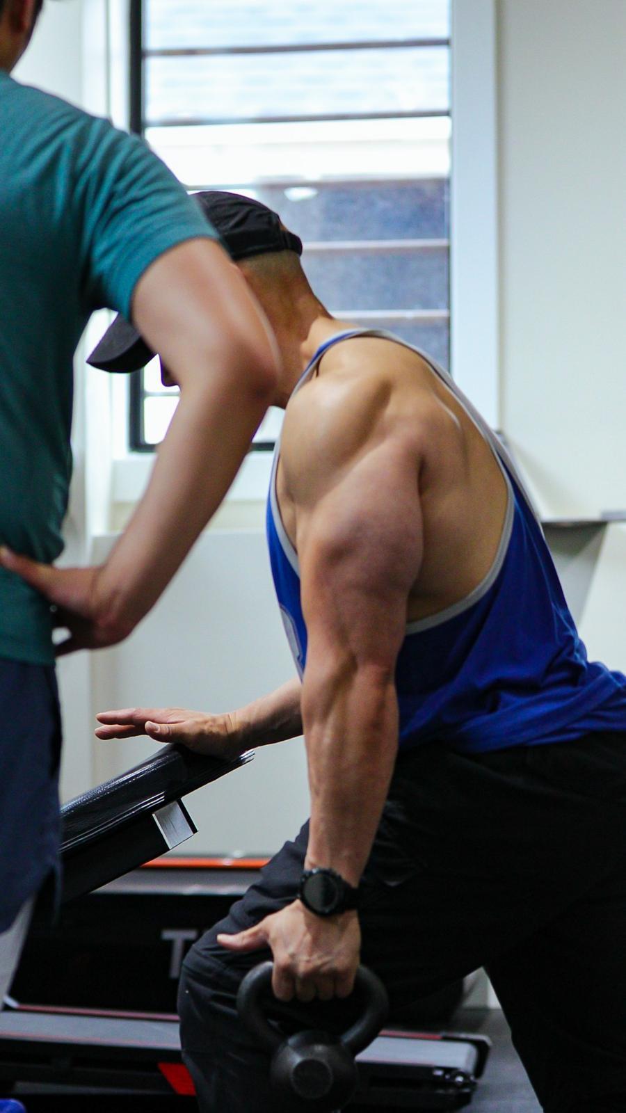 Mind-muscle connection training during a single-arm kettlebell row